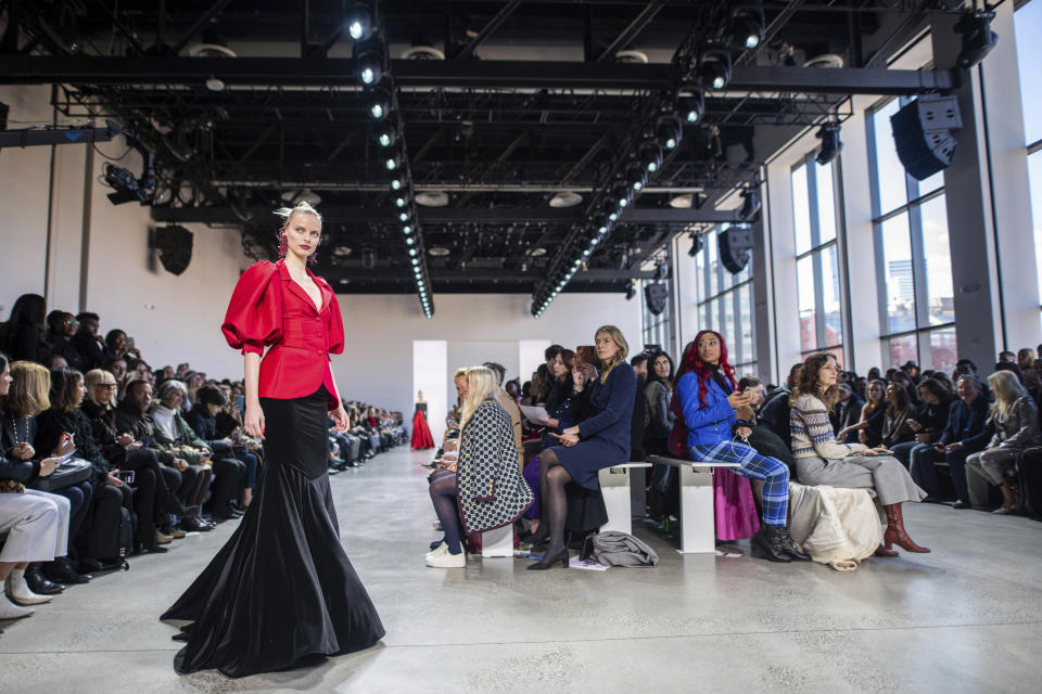 The Badgley Mischka collection is modeled at Spring Studios during NYFW Fall/Winter 2020 on Saturday, Feb. 8, 2020, in New York. (Photo by Charles Sykes/Invision/AP)