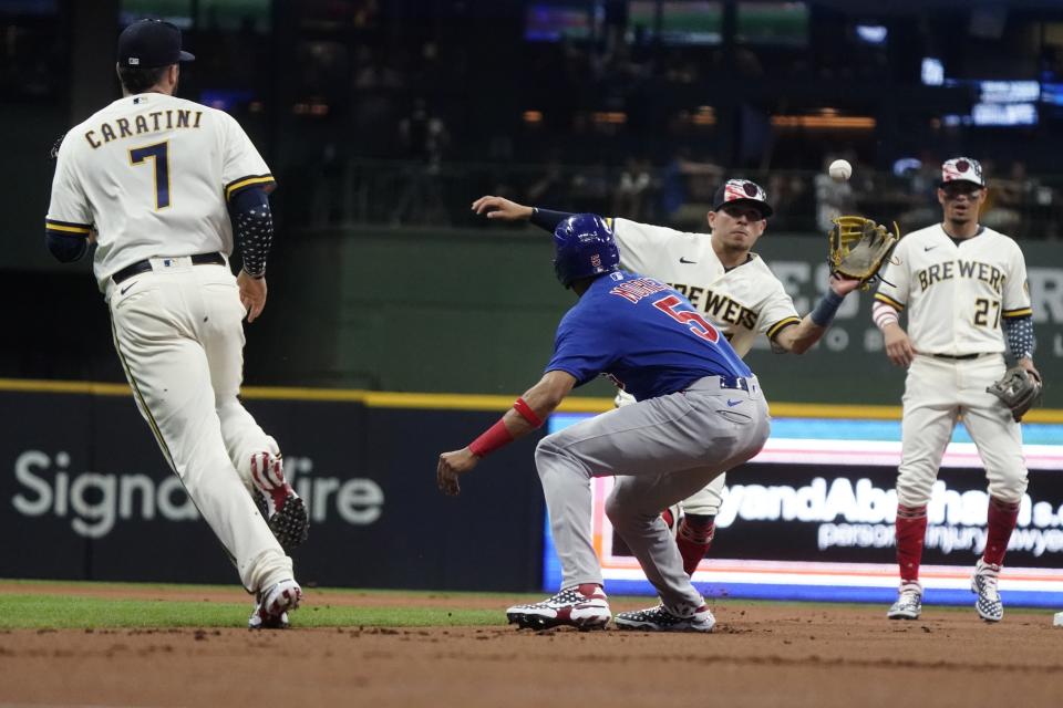 Chicago Cubs' Christopher Morel is caught in a rundown during the first inning of a baseball game against the Milwaukee Brewers Monday, July 4, 2022, in Milwaukee. (AP Photo/Morry Gash)