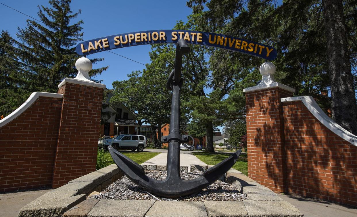 Students walk through Lake Superior State University during a move-in day for students at Lake Superior State University in Sault Ste. Marie located in Michigan's Upper Peninsula on Wednesday, Aug. 5, 2020.