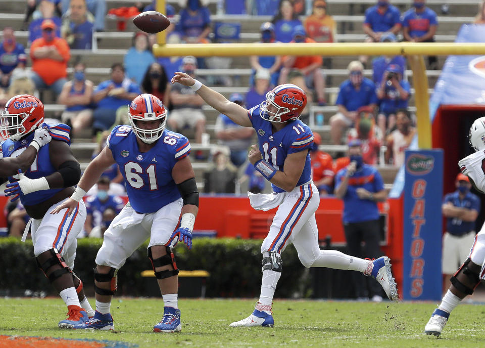 Florida quarterback Kyle Trask (11) throws a pass against South Carolina during an NCAA college football game in Gainesville, Fla., Saturday, Oct. 3, 2020. (Brad McClenny/The Gainesville Sun via AP, Pool)