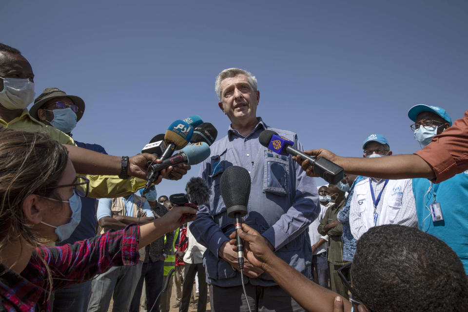 Filippo Grandi, U.N. High Commissioner for Refugees, briefs the press at Umm Rakouba refugee camp sheltering people who fled the conflict in Ethiopia's Tigray region in Qadarif, eastern Sudan, Saturday, Nov. 28, 2020. (AP Photo/Nariman El-Mofty)