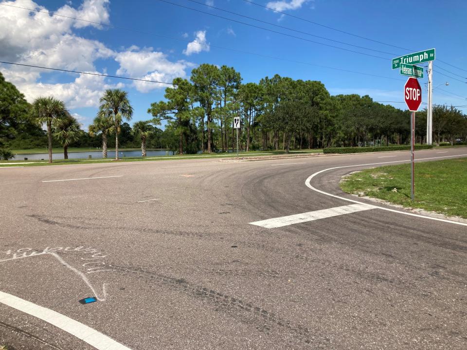 Markings of where a crash happened Sept. 30 at Southeast Veterans Memorial Parkway and Southeast Triumph Road in Port St. Lucie can be seen with orange paint near center of picture. Daniel M. Portillo, 17, who was riding a bicycle when he was hit just before 6 a.m. died Oct. 1 in a local hospital, according to Port St. Lucie police.