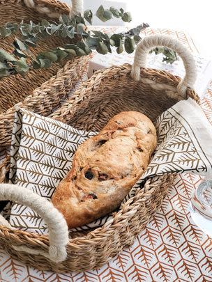 A decor-worthy woven bread basket for displaying bundles of fall florals, the apples you pick or the delectable desserts you're cooking up