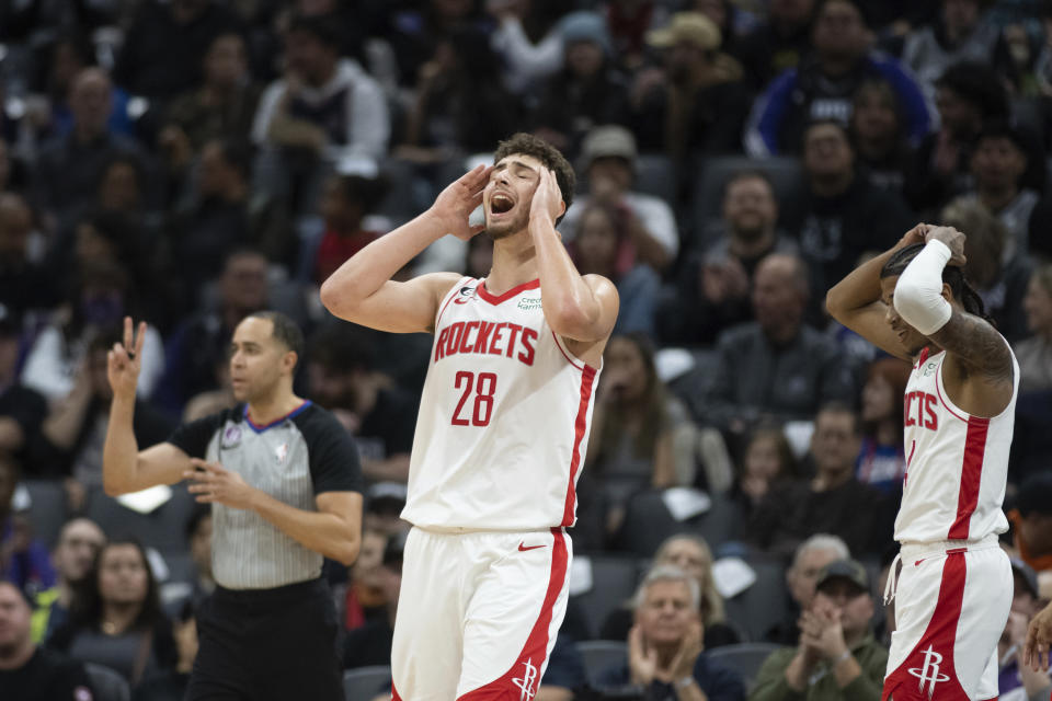 Houston Rockets center Alperen Sengun (28) reacts after being whistled or a blocking foul during the first half of the team's NBA basketball game against the Sacramento Kings in Sacramento, Calif., Friday, Jan. 13, 2023. (AP Photo/José Luis Villegas)