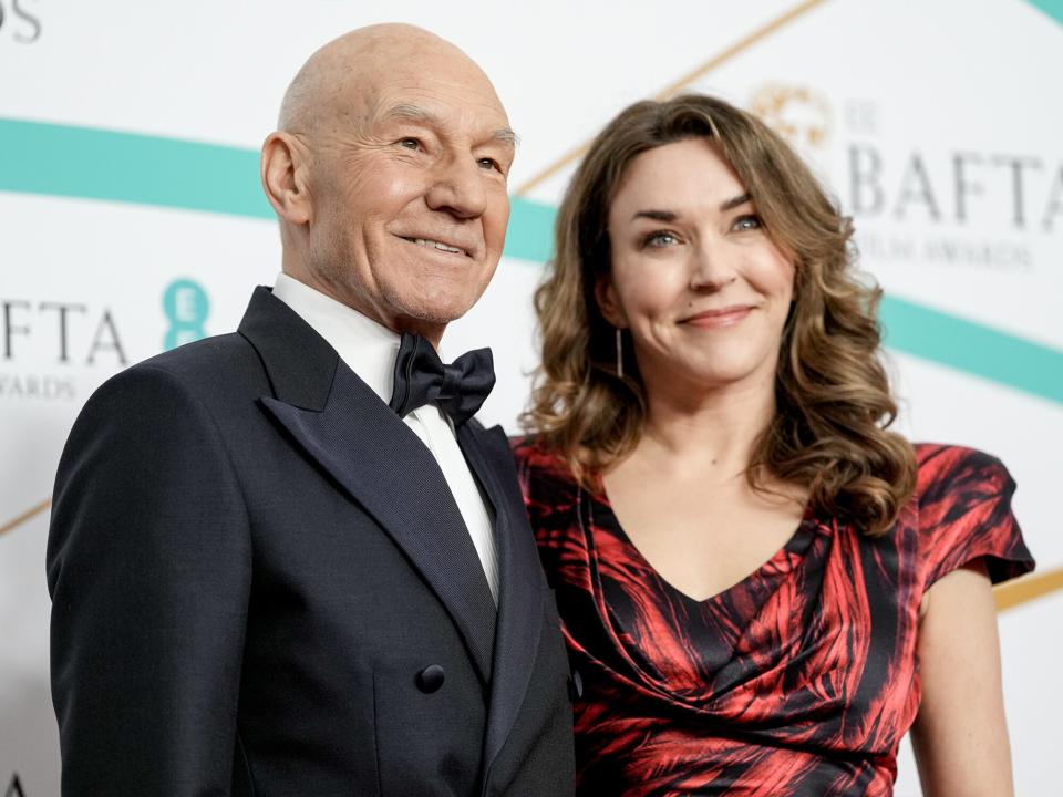 Sir Patrick Stewart and Sunny Ozell attend the EE BAFTA Film Awards 2023 at The Royal Festival Hall on February 19, 2023 in London, England