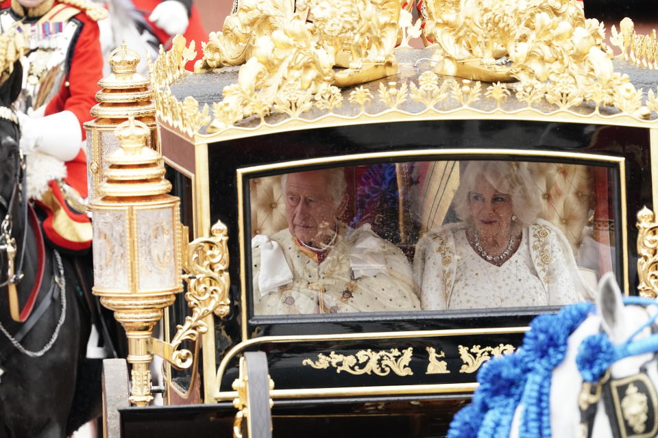 King Charles III and Queen Camilla are carried in the Diamond Jubilee State Coach in the King's Procession from Buckingham Palace to their coronation ceremony London. Picture date: Saturday May 6, 2023. (Photo by Jordan Pettitt/PA Images via Getty Images)