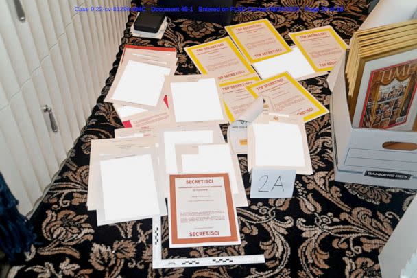 PHOTO: FBI photograph of redacted documents and classified cover sheets recovered from a container stored in former U.S. president Donald Trump's Florida estate that was included in a U.S. Department of Justice filing Aug. 30, 2022.  (U.s. Department Of Justice via Reuters)