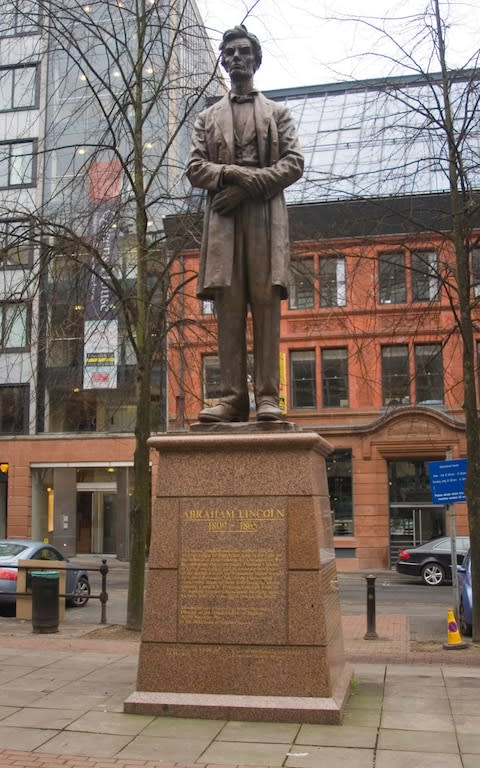 Statue of Abraham Lincoln, Lincoln Square, Manchester, inscribed with his letter of thanks to the city's cotton weavers - Credit: Phil Portus / Alamy Stock Photo