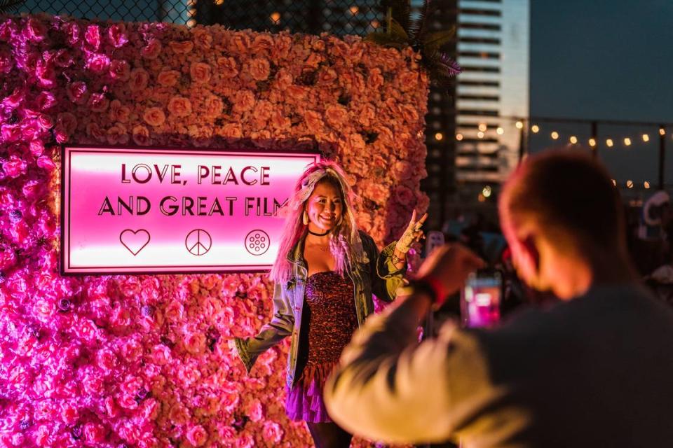 Take selfies or play games before the show begins at Rooftop Cinema Club. You can also order finger food, popcorn, pizza and cocktails.