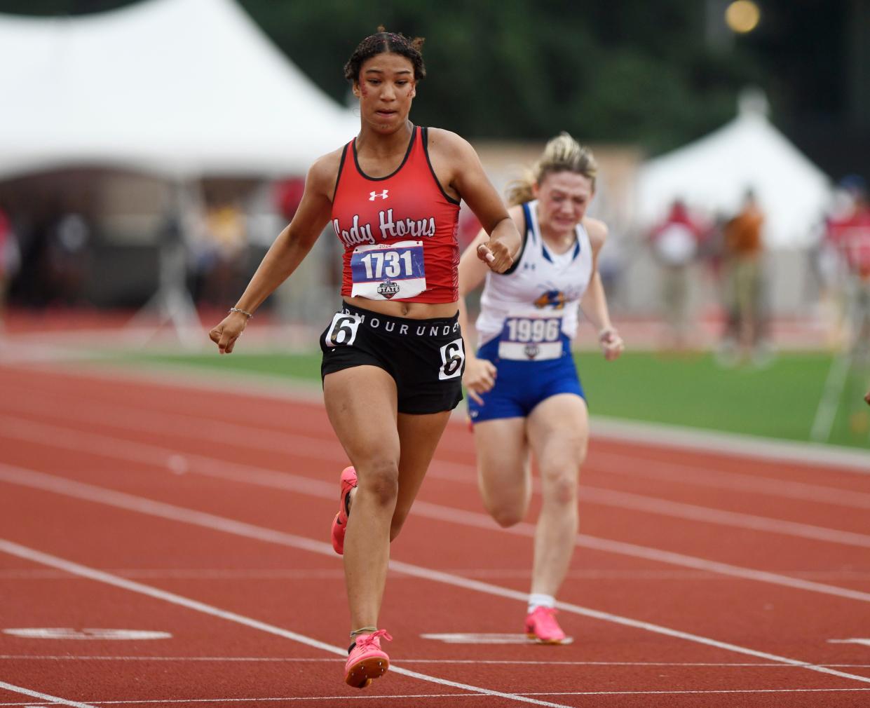 Loop's Kamryn Dyck competes in the 100-meter dash during the Class 1A UIL State track and field meet, Saturday, May 4, 2024, at Mike A. Myers Stadium in Austin.