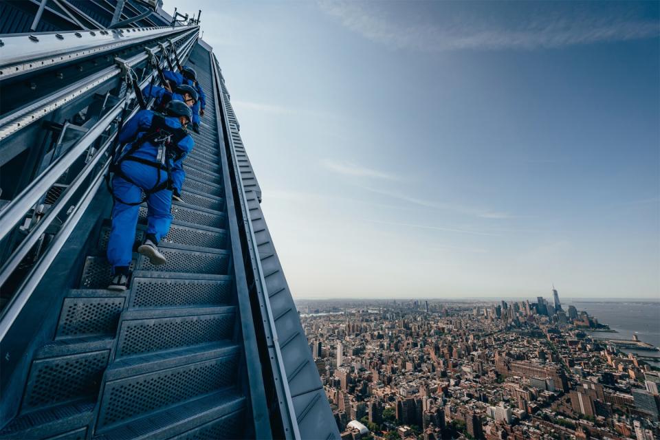 Climbing the stairs of City Climb at the Edge over NYC