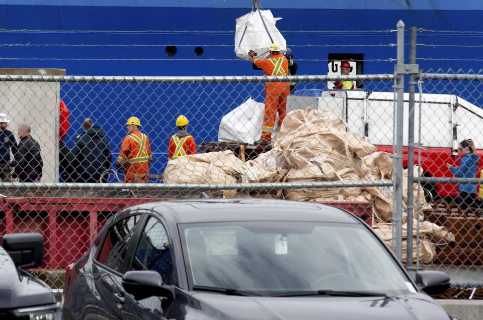 Debris from the Titan submersible, recovered from the ocean floor near the wreck of the Titanic, is unloaded from the ship Horizon Arctic at the Canadian Coast Guard pier in St. John's, Newfoundland on Wednesday, June 28, 2023. (Paul Daly/The Canadian Press via AP)