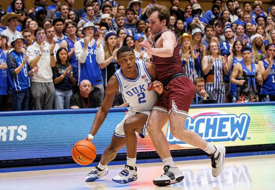 Bellarmine’s Ben Johnson, right, the former Lexington Catholic High School star, guarded Duke’s Jaylen Blakes (2) during the Knights’ 74-57 loss to the Blue Devils in Cameron Indoor Stadium last week. Ben McKeown/AP