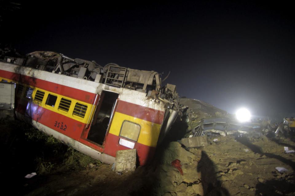 Rescuers work at the site of passenger trains accident, in Balasore district, in the eastern Indian state of Orissa, Saturday, June 3, 2023.Two passenger trains derailed in India, killing more than 200 people and trapping hundreds of others inside more than a dozen damaged rail cars, officials said. (AP Photo)