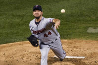 Minnesota Twins starting pitcher Rich Hill delivers against the Chicago Cubs during the first inning of a baseball game Friday, Sept. 18, 2020, in Chicago. (AP Photo/David Banks)