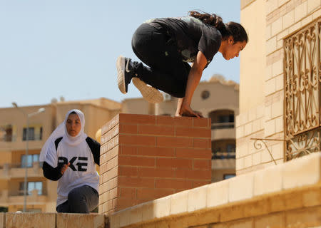 Egyptian women from Parkour Egypt "PKE" practice their parkour skills around buildings on the outskirts of Cairo, Egypt July 20, 2018. REUTERS/Amr Abdallah Dalsh