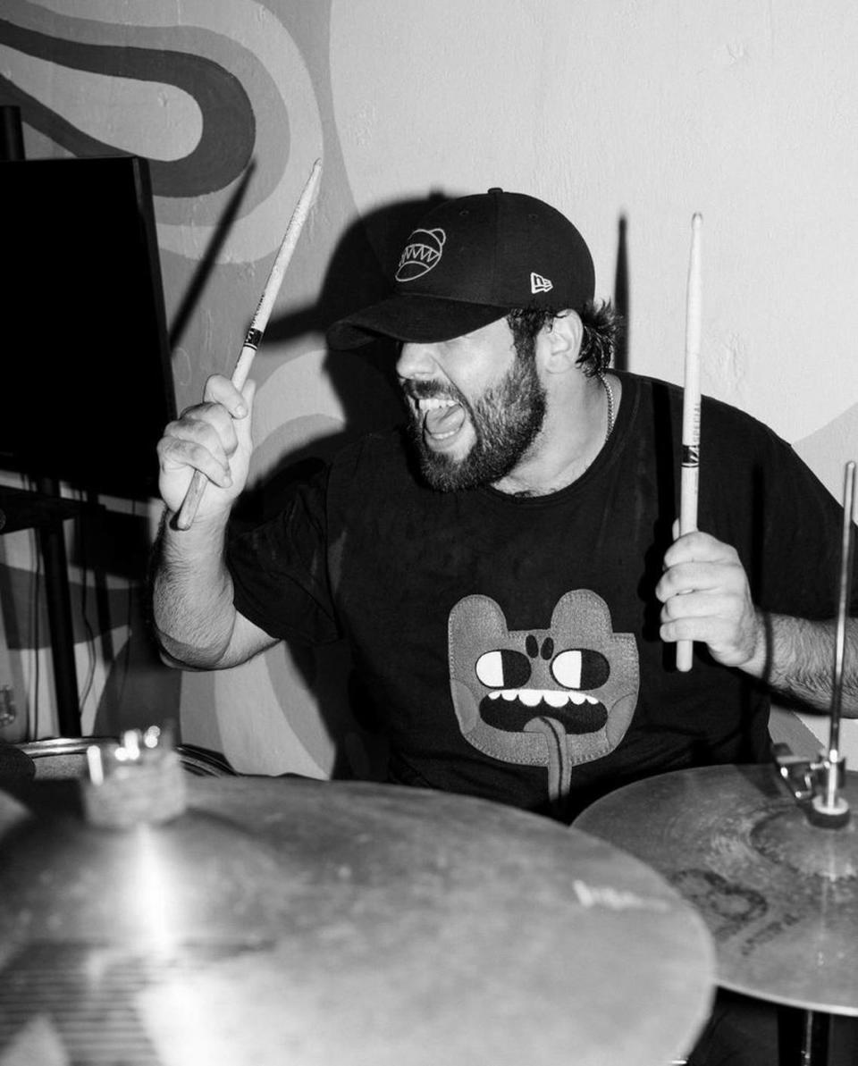 Drummer Javier Nin plays for several local bands in Miami. The local music scene is currently experiencing a shortage of drummers.