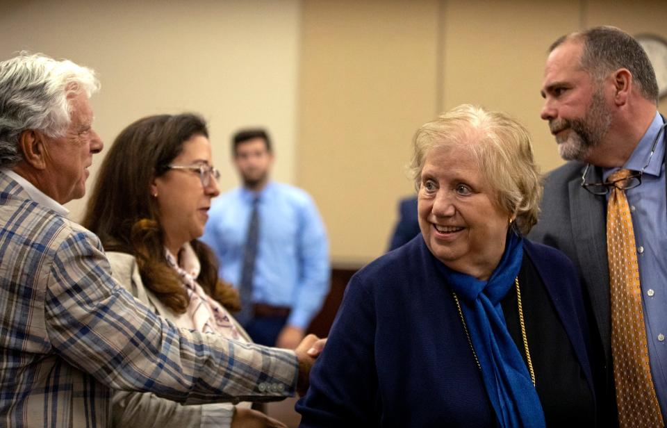 State Attorney Jack Campbell greets the Markel family after the jury finds Katherine Magbanua guilty on all counts on Friday, May 27, 2022 in her retrial for the 2014 murder of Dan Markel in Tallahassee, Fla. 