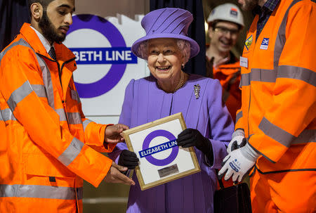 FILE PHOTO: Britain's Queen Elizabeth attends the formal unveiling of the new logo for Crossrail, which is to be named the Elizabeth line, at the construction site of the Bond Street station in central London, February 23, 2016. REUTERS/Richard Pohle/Pool/File Photo