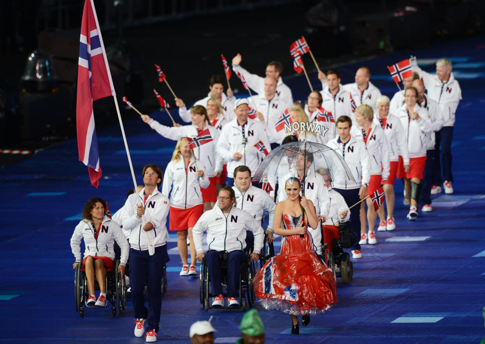 LONDON, ENGLAND - AUGUST 29: Sailor Aleksander Wang-Hansen of Norway carries the flag during the Opening Ceremony of the London 2012 Paralympics at the Olympic Stadium on August 29, 2012 in London, England. (Photo by Gareth Copley/Getty Images)