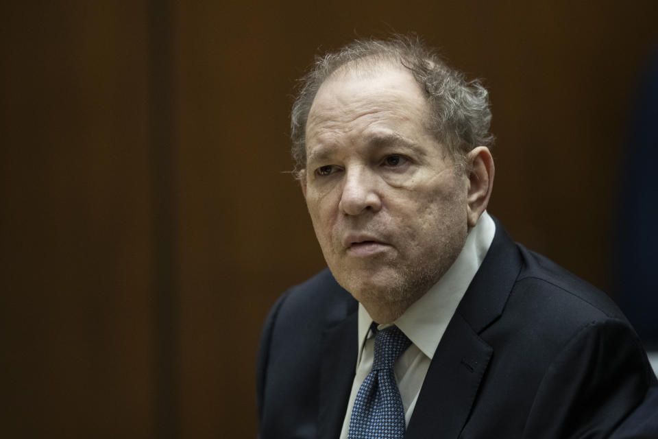 FILE - Former film producer Harvey Weinstein appears in court at the Clara Shortridge Foltz Criminal Justice Center in Los Angeles, Calif., on Oct. 4 2022. Opening statements are set to begin Monday in the disgraced movie mogul Harvey Weinstein's Los Angeles rape and sexual assault trial. Weinstein is already serving a 23-year-old sentence for a conviction in New York. (Etienne Laurent/Pool Photo via AP, File)