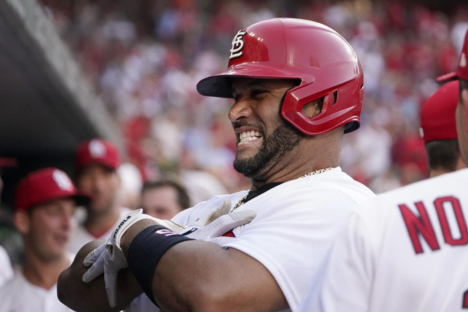 St. Louis Cardinals' Albert Pujols celebrates after hitting a solo home run during the second inning of a baseball game against the Los Angeles Dodgers Tuesday, July 12, 2022, in St. Louis. (AP Photo/Jeff Roberson)