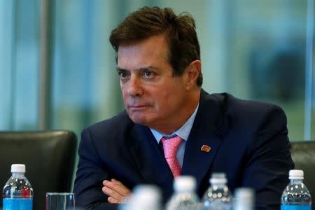 Paul Manafort of Republican presidential nominee Donald Trump's staff listens during a round table discussion on security at Trump Tower in the Manhattan borough of New York, U.S., August 17, 2016. Picture taken August 17, 2016. REUTERS/Carlo Allegri
