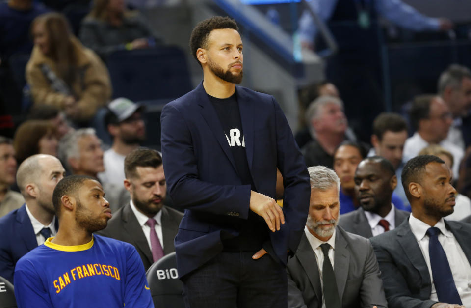 SAN FRANCISCO, CA: DECEMBER 23: Golden State Warriors' Stephen Curry watches from the bench in the fourth quarter of their NBA game against the Minnesota Timberwolves at the Chase Center in San Francisco, Calif., on Monday, Dec. 23, 2019. (Jane Tyska/Digital First Media/The East Bay Times via Getty Images)