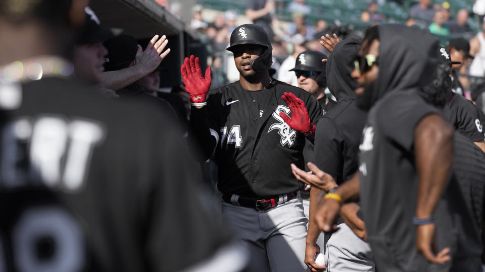 Chicago White Sox's Eloy Jimenez (74) celebrates his two-run home run against the Detroit Tigers in the seventh inning of a baseball game in Detroit, Monday, Sept. 27, 2021. (AP Photo/Paul Sancya)