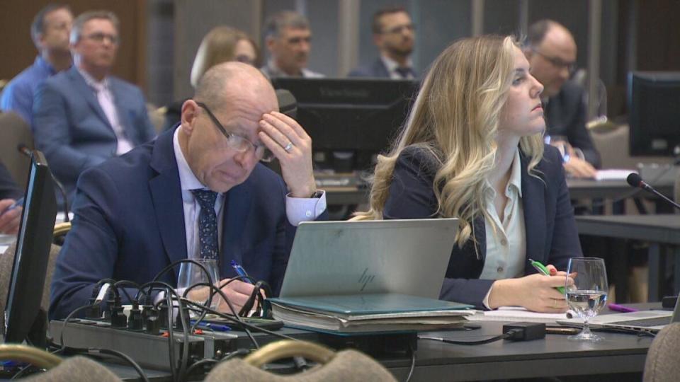 Energy and Utilities Board lawyer Abigail Herrington (right) at N.B. Power's 2023 rate hearing. At a hearing Friday, Herrington pressed N.B. Power about how much of a surprise it was to the utility when the provincial government moved its debt targets and delayed its rate increase application.