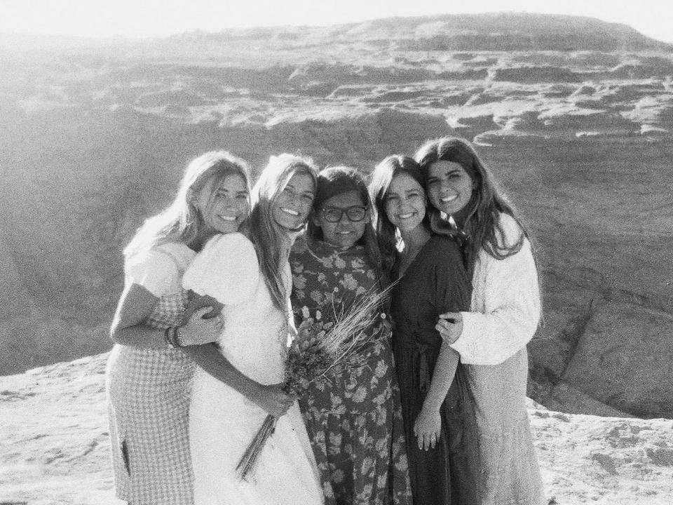 A group of sisters in front of a canyon