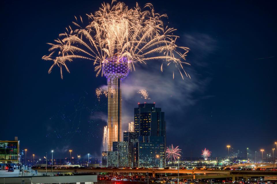 A view of the Dallas city skyline and Reunion Tower and fireworks during the Dallas New YearÕs Eve celebration after the game between the Dallas Stars and the Chicago Blackhawks at the American Airlines Center on Dec 31, 2023.