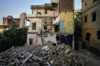 Destruction remains near the site of last year’s massive deadly explosion, in Beirut, Lebanon, Saturday, July 17, 2021. A year after the Aug. 4 blast at the Beirut port that killed more than 200 people, families of the victims are consumed with winning justice for their loved ones and punishing Lebanon's political elite, blamed for causing the disaster through their corruption and neglect. (AP Photo/Hassan Ammar)