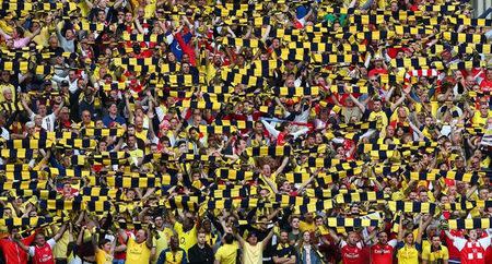 Arsenal fans. Reuters / Eddie Keogh