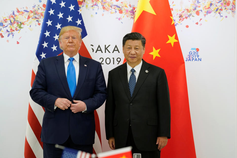 U.S. President Donald Trump poses for a photo with China's President Xi Jinping before their bilateral meeting during the G20 leaders summit in Osaka, Japan, June 29, 2019. REUTERS/Kevin Lamarque