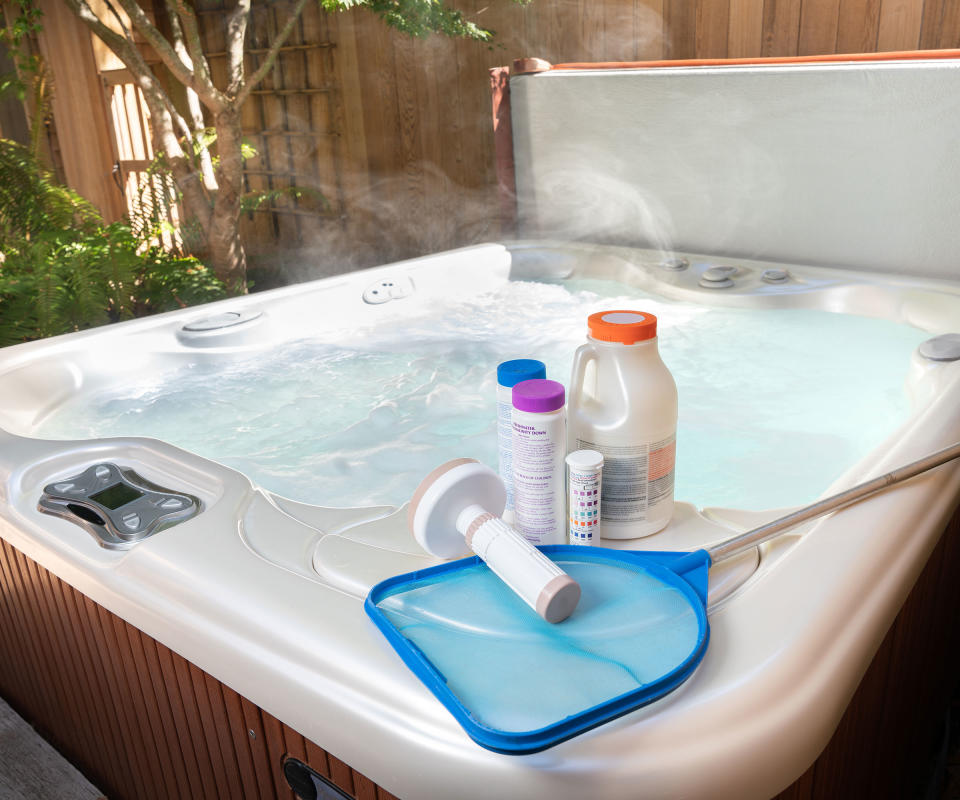 cleaning a hot tub with chemicals