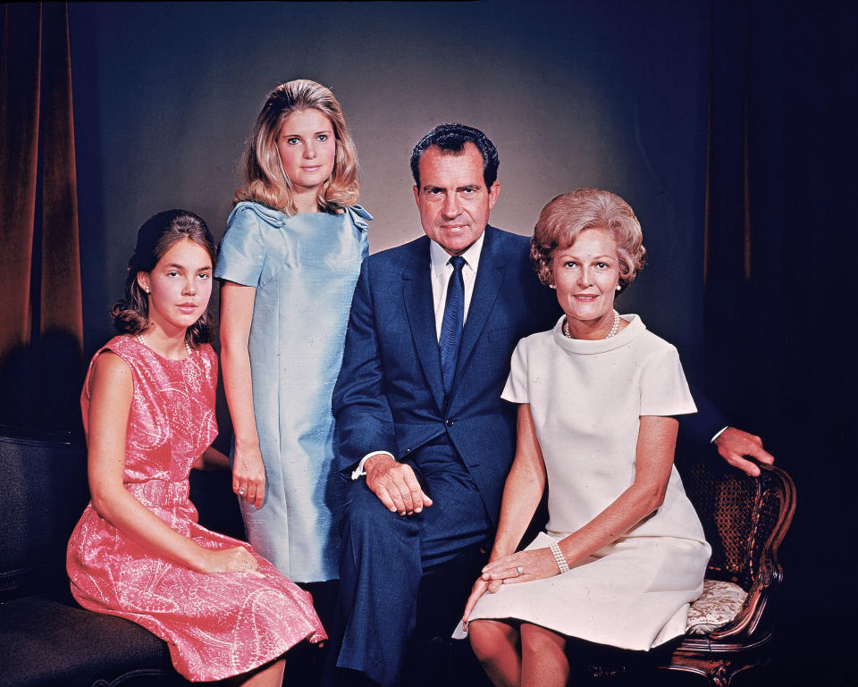 President Richard Nixon poses with First Lady Pat Nixon and their daughters Patricia and Julie in this 1970 family portrait.