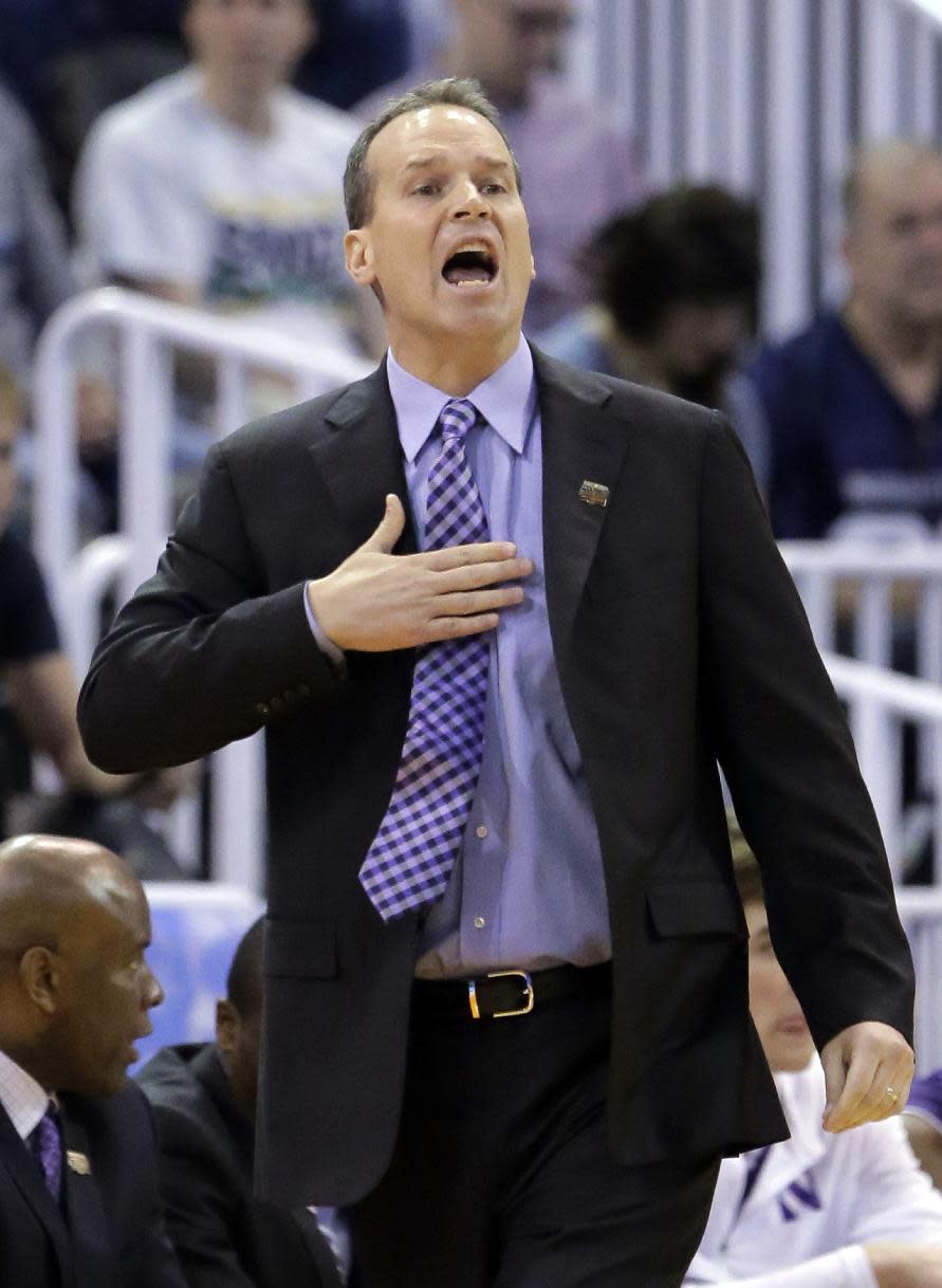 Northwestern head coach Chris Collins shouts to his team during the first half of a second-round college basketball game against Gonzaga in the men's NCAA Tournament, Saturday, March 18, 2017, in Salt Lake City. (AP Photo/Rick Bowmer)