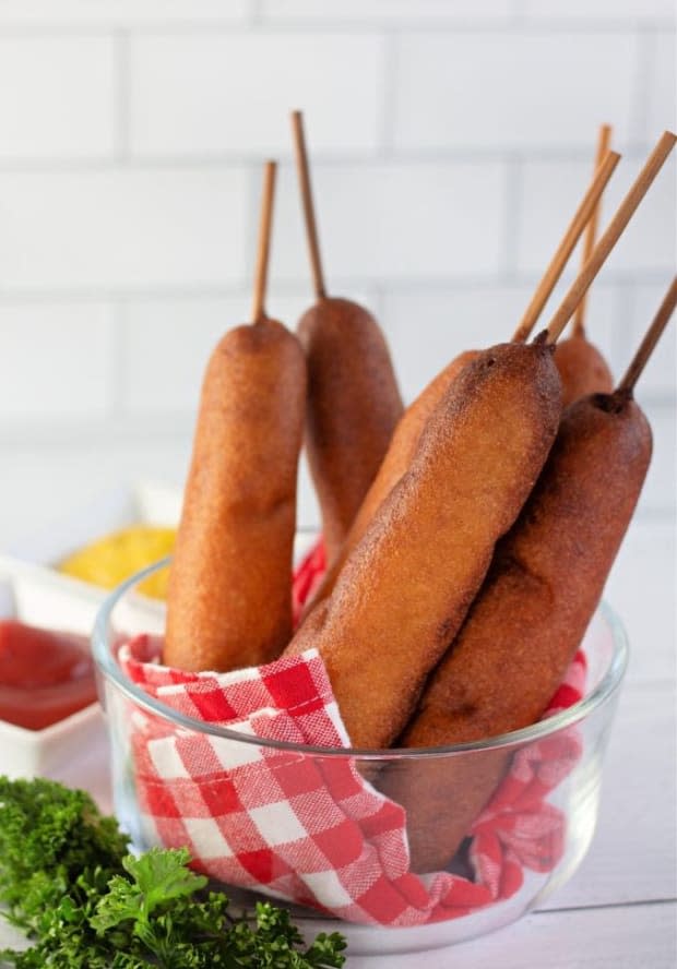 <p><a href="https://kitchenfunwithmy3sons.com/homemade-corn-dogs/" rel="nofollow noopener" target="_blank" data-ylk="slk:Kitchen Fun With My Three Sons;elm:context_link;itc:0;sec:content-canvas" class="link ">Kitchen Fun With My Three Sons</a></p>