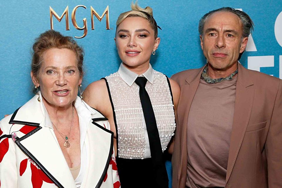 <p>Dominik Bindl/WireImage</p> Florence Pugh and her parents Deborah Mackin and Clinton Pugh attend MGM