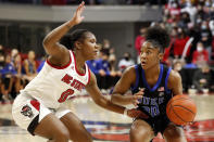 Duke Blue's Shayeann Day-Wilson, right, tries to drive the ball past North Carolina State's Diamond Johnson (0) during the first half of an NCAA college basketball game, Sunday, Jan. 16, 2022, in Raleigh, N.C. (AP Photo/Karl B. DeBlaker)