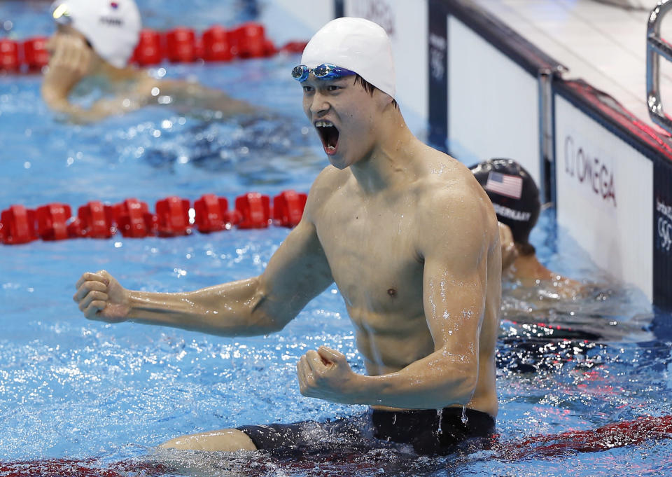 China's Sun Yang reacts after finishing first in the men's 400-meter freestyle swimming final at the Aquatics Centre in the Olympic Park during the 2012 Summer Olympics in London, Saturday, July 28, 2012.(AP Photo/Daniel Ochoa De Olza)