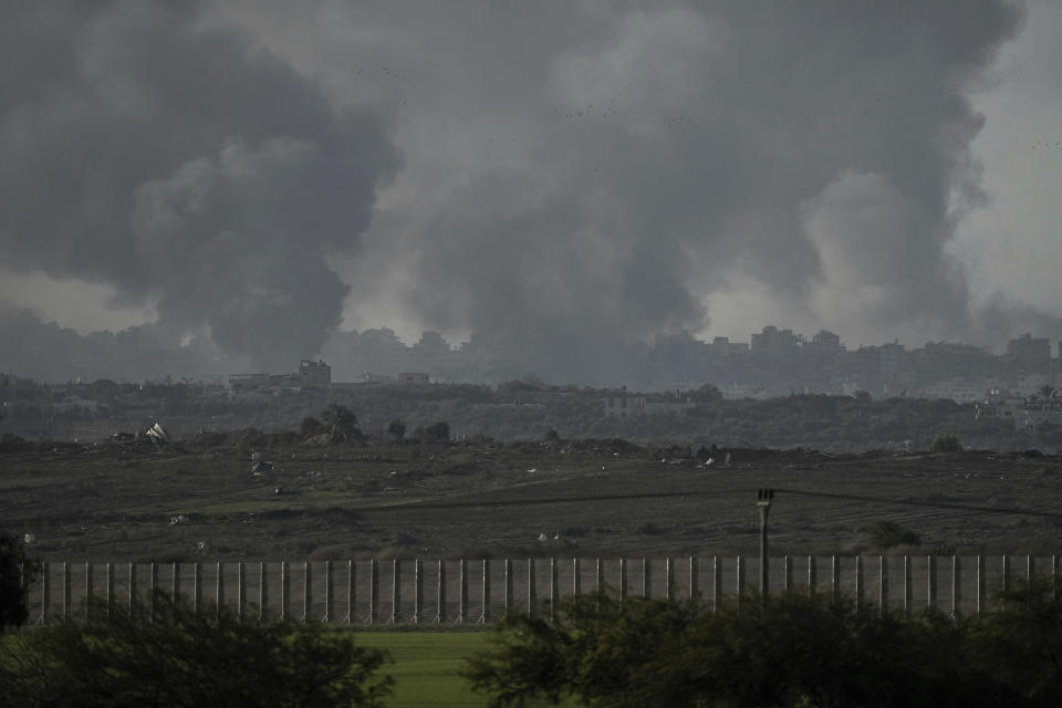 Smoke rises following an Israeli bombardment in the Gaza Strip, as seen from southern Israel, Tuesday, Dec. 26, 2023. The army is battling Palestinian militants across Gaza in the war ignited by Hamas' Oct. 7 attack into Israel. (AP Photo/Leo Correa)