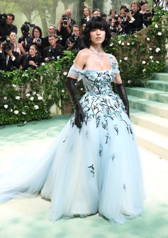 <p>Jamie McCarthy/Getty Images</p><p>The actor donned this blue gown with floral embellishments, but the real standout was her new black bob and leather gloves. </p>