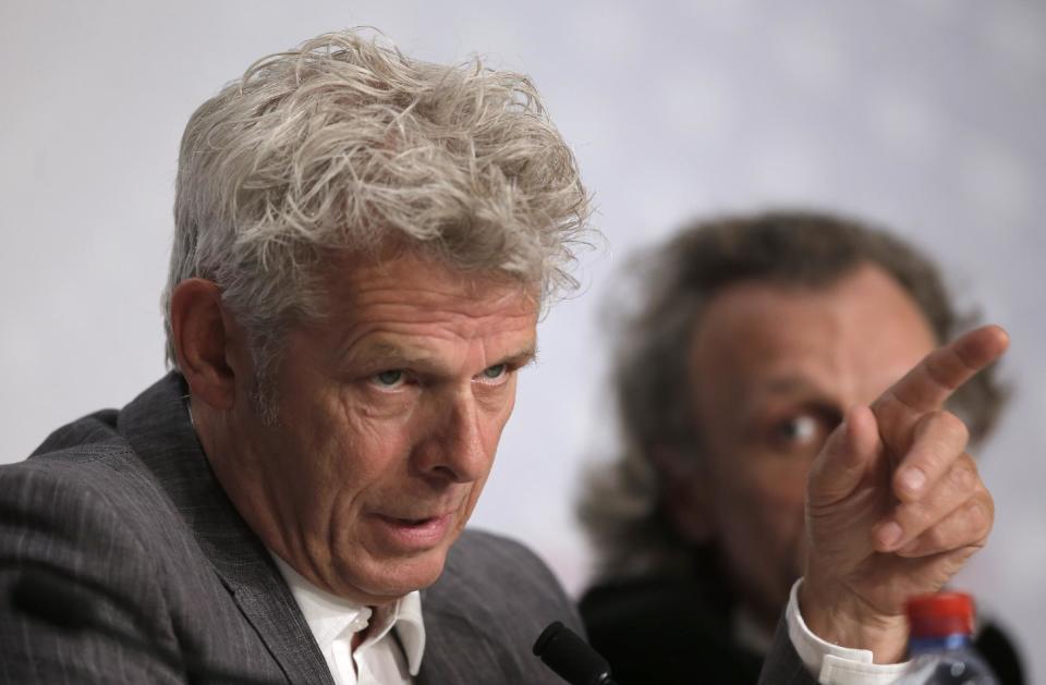 Director Alex van Warmerdam, left, speaks during a press conference for Borgman at the 66th international film festival, in Cannes, southern France, Sunday, May 19, 2013. (AP Photo/Francois Mori)