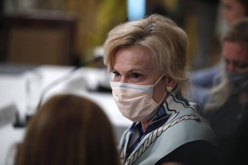 Dr. Deborah Birx, White House coronavirus response coordinator arrives for a "National Dialogue on Safely Reopening America's Schools," event in the East Room of the White House, Tuesday, July 7, 2020, in Washington. (AP Photo/Alex Brandon)