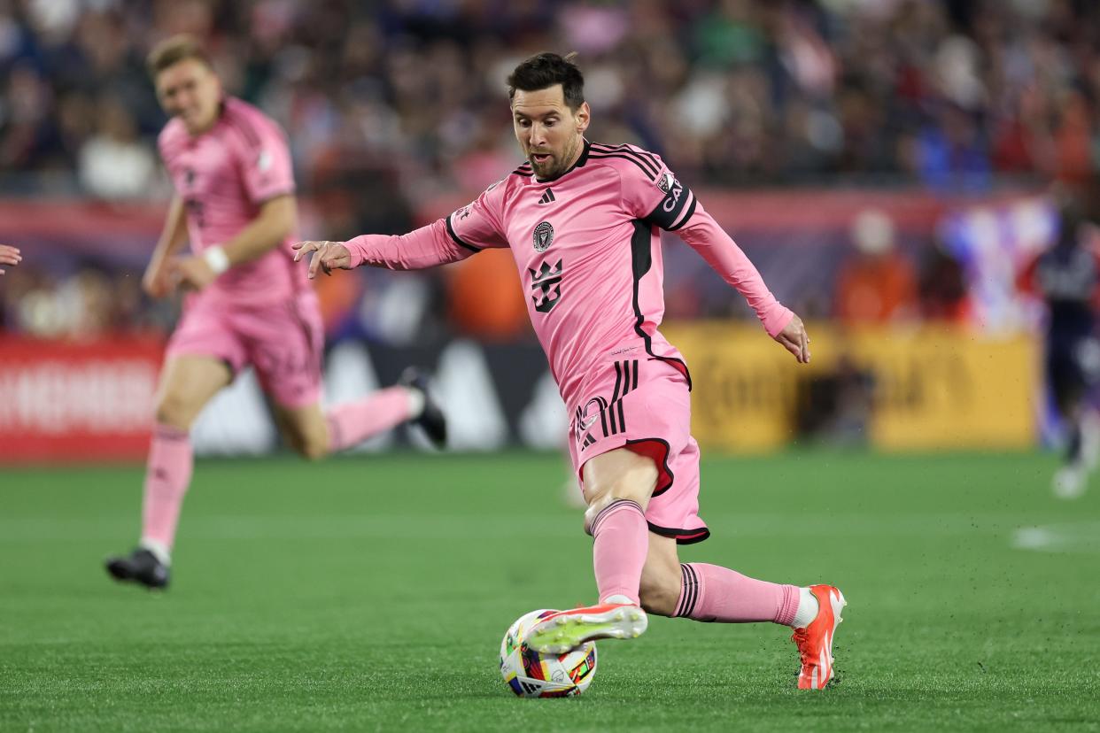 Inter Miami CF midfielder Lionel Messi controls the ball during the second half against the New England Revolution at Gillette Stadium on Saturday night.