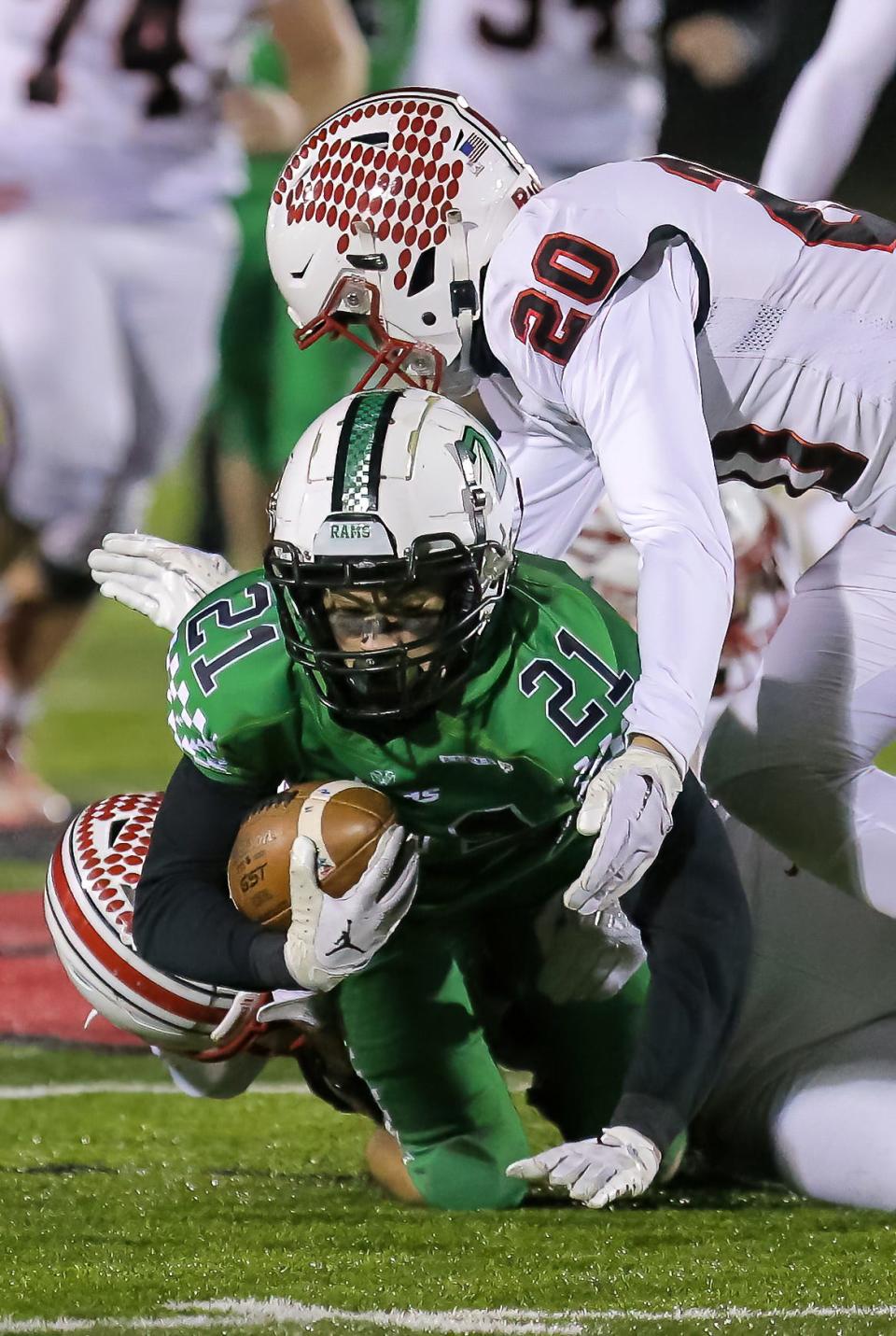 Badin's Carson Cheek (21) caught the game-winning pass against Wapakoneta to extend Badin's undefeated season.