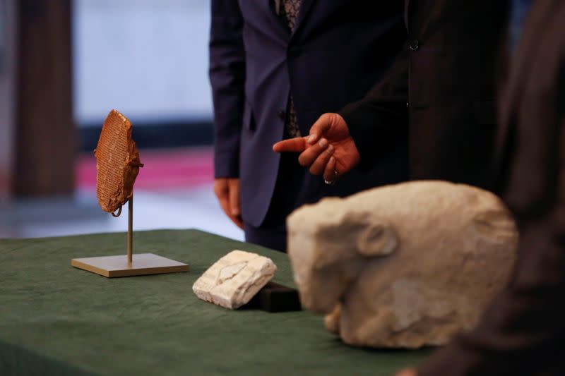 The Gilgamesh Dream Tablet, stolen from Iraq in 1991, and other artefacts, are displayed at the Ministry of Foreign Affairs in Baghdad