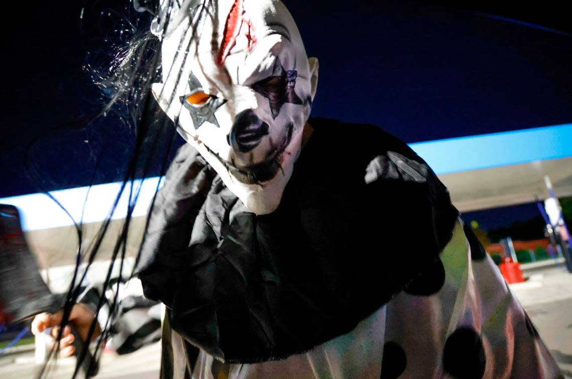 A scary ghoul peers into a car during the Haunted car wash experience at the Hurricane Express Wash. The car washes are offering a haunted car wash experience through Halloween.